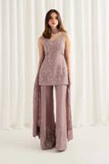 Model wearing Rungish dusty mauve embellished tunic and wide-leg trousers set
