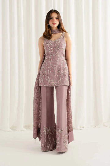 Model wearing Rungish dusty mauve embellished tunic and wide-leg trousers set